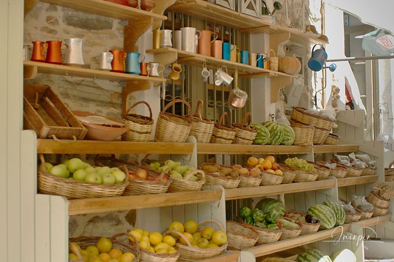 Shopping in a Greek alleyway on the Island Naxos in the village of Filot