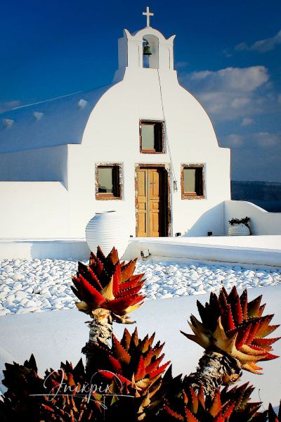 Greek church in the village of Oia on the island of Santorini